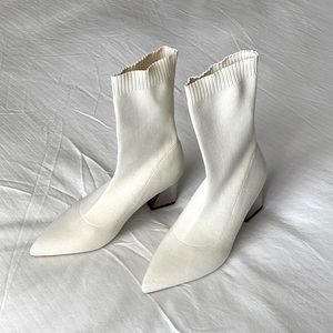 White elastic sock ankle boot pointed toe and metallic heel